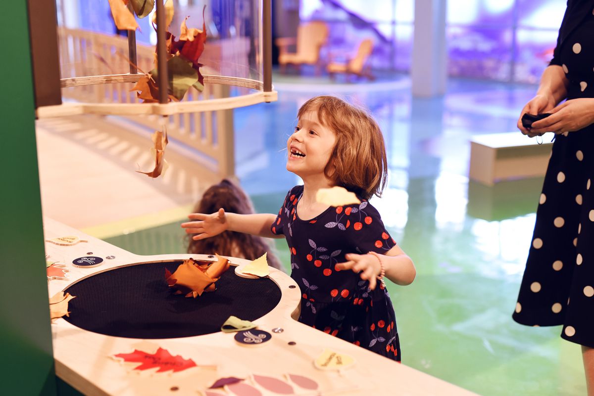 A small child at the Mini Mondo exhibit
