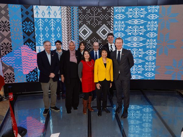 Image showing people standing together for a ribbon cutting event