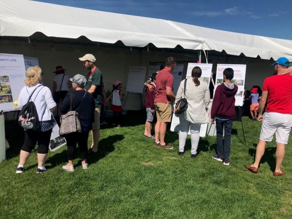 A group of people outdoors at a community event